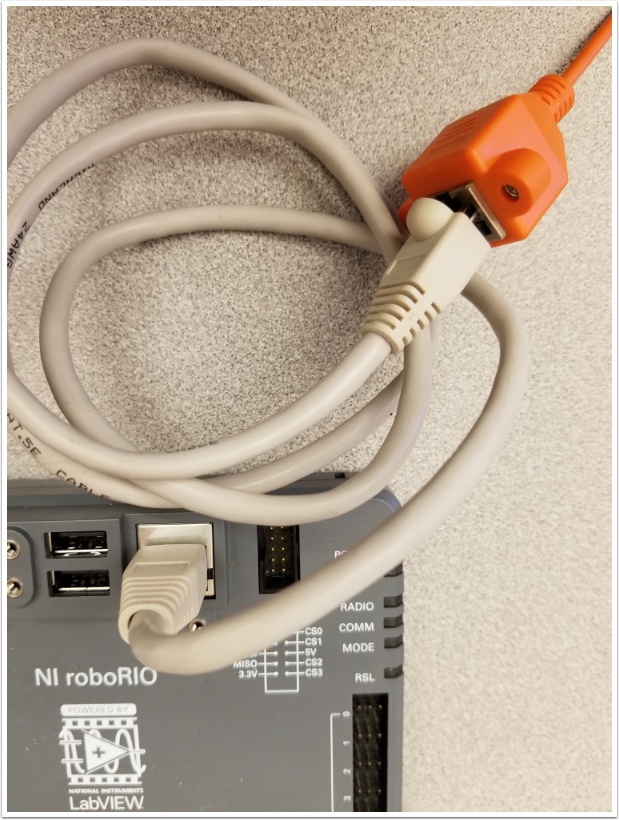 Connecting Ethernet from the roboRIO to the PoE cable.